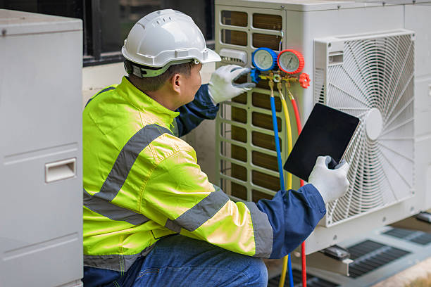 Professional Hvac technician working in Greenville, MS